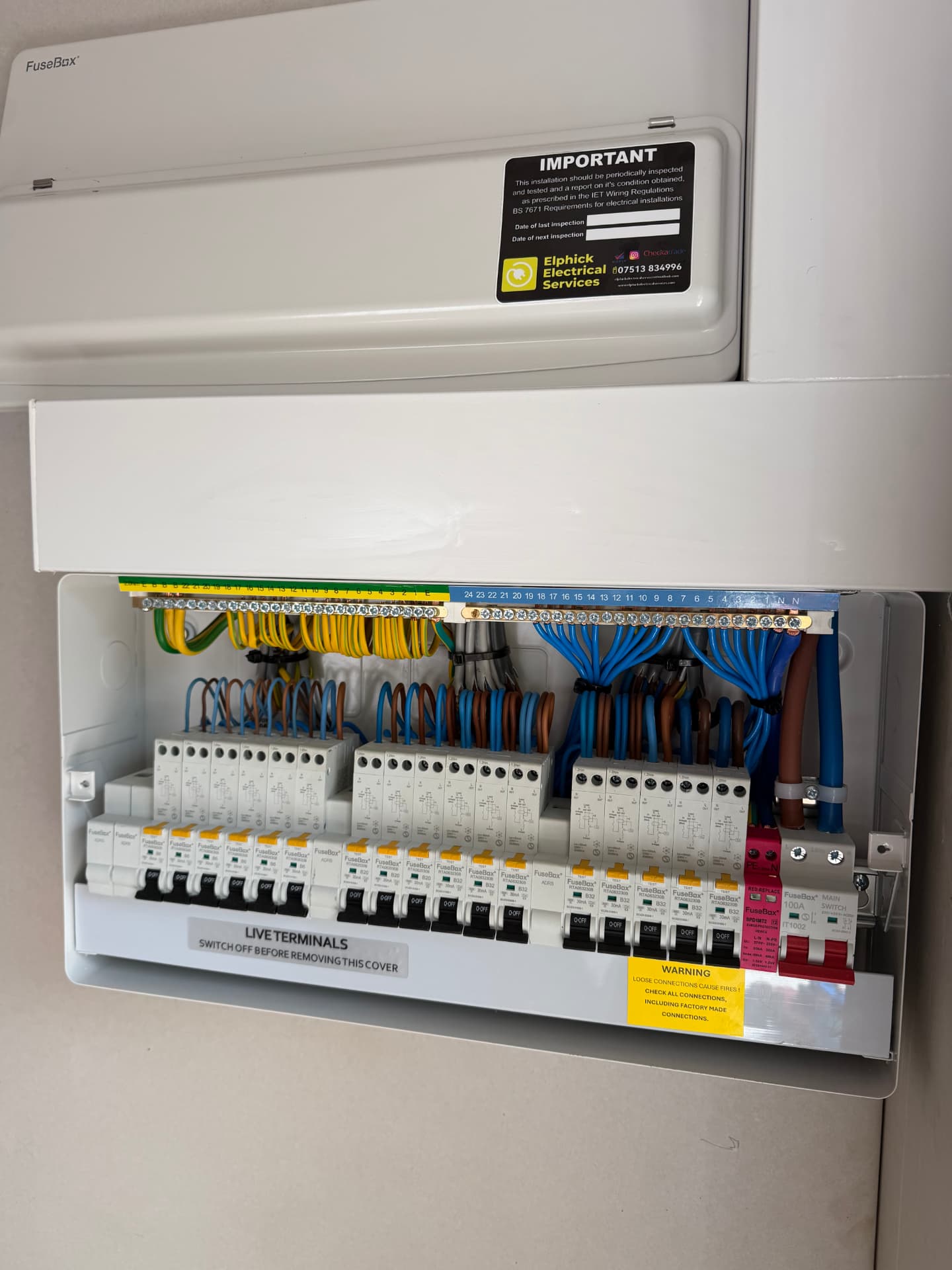 Consumer unit upgrade with FuseBox RCBOs, surge protection and neatly terminated wiring, beside a sealed second board